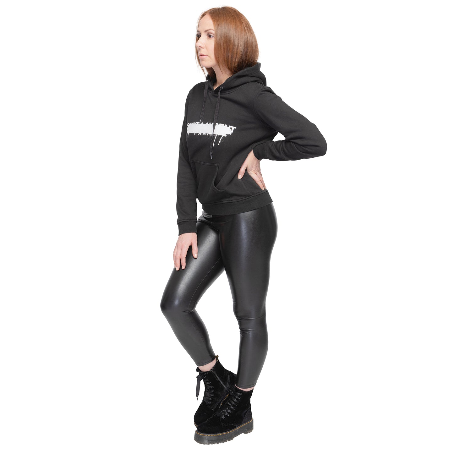 graphic hoodie worn with faux leather leggings