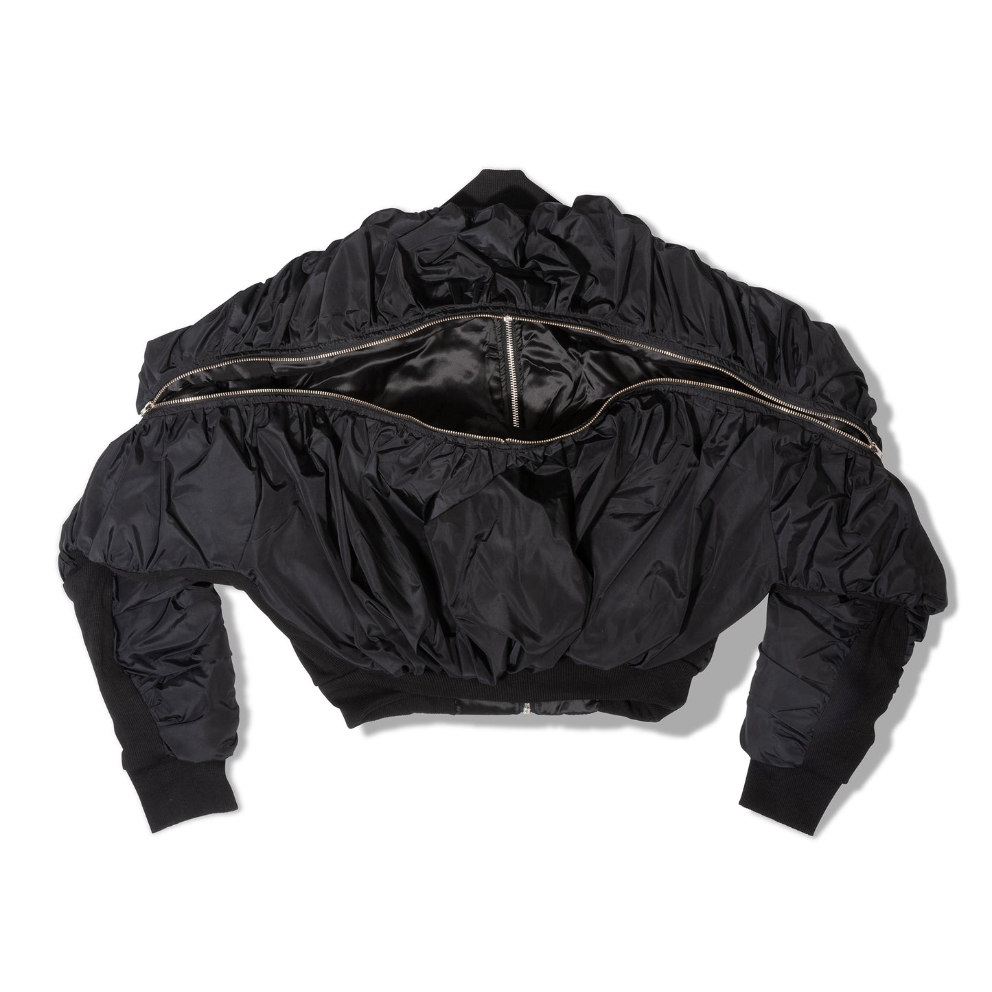 "Cropped bomber jacket styled with leather leggings and combat boots