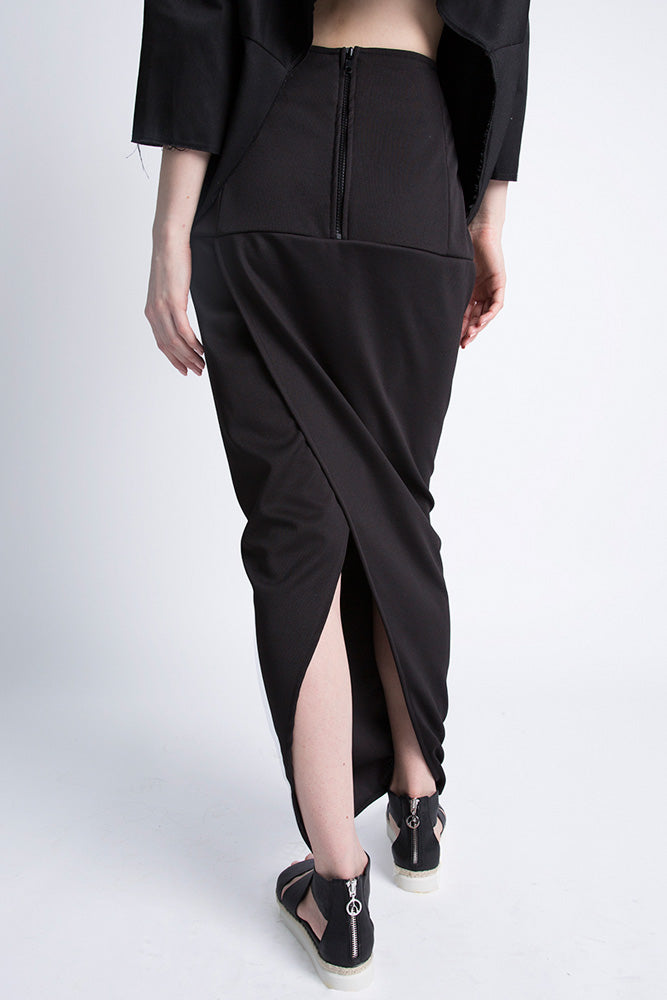 Side view of black slit skirt with elegant silhouette"